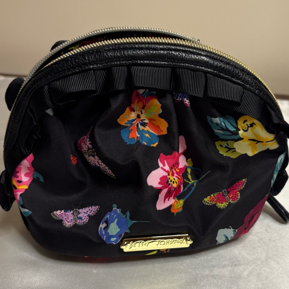 Betsey Johnson cosmetic bag, floral with black ribbon trim,